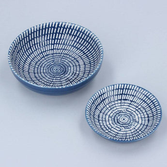 Set of two navy ceramic trinket dishes by Gisela Graham, featuring a dash pattern, ideal for jewelry or small accessories.