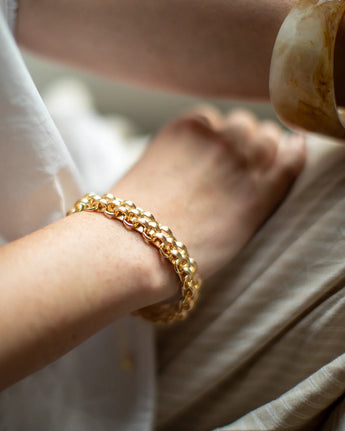 Gold CHALK UK mesh chain bracelet with intricate links, stylish and lightweight jewelry accessory for everyday wear.