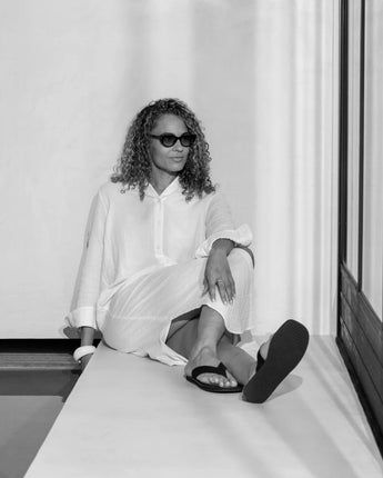 Sky blue Sarah dress by CHALK UK, stylish women's clothing with a relaxed fit and elegant design, shown on a model.