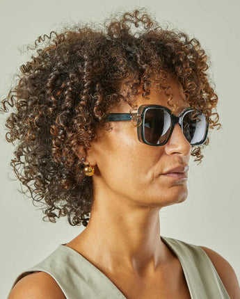 Chalk UK Vienna sunglasses with black frames and dark tinted lenses, stylish eyewear for sunny days.