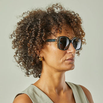 Chalk UK Vienna sunglasses with black frames and dark tinted lenses, stylish eyewear for sunny days.