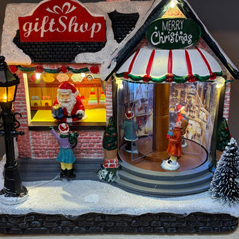 Crystal World Christmas gift shop light-up ornament, festive seasonal decoration with illuminated details for holiday decor.