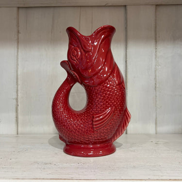 Large cranberry Gluggle Jug by The Gluggle Jug Factory, featuring a classic design and distinctive spout.