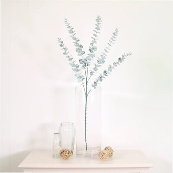 Artificial eucalyptus dusted single stem flower from Lotus Imports Ltd, realistic faux eucalyptus branch with dusted leaves.