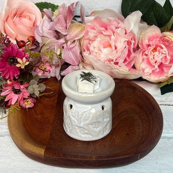 Freckleface Botanical Small Leaf Wax Burner with green leaf design for melting scented wax melts on a flat surface.