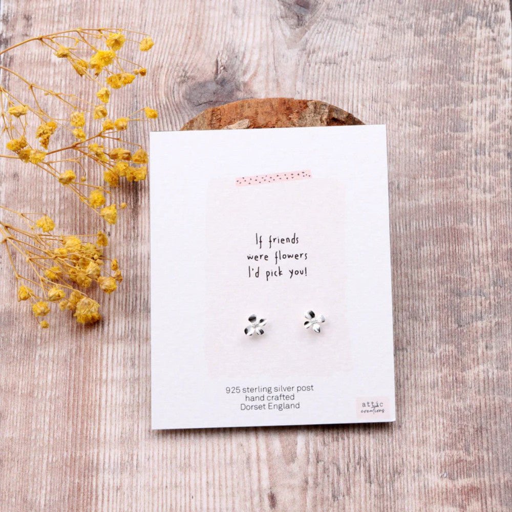 Silver earrings featuring floral designs from Attic Creations' Friends Were Flowers collection, showcasing elegant jewelry style.