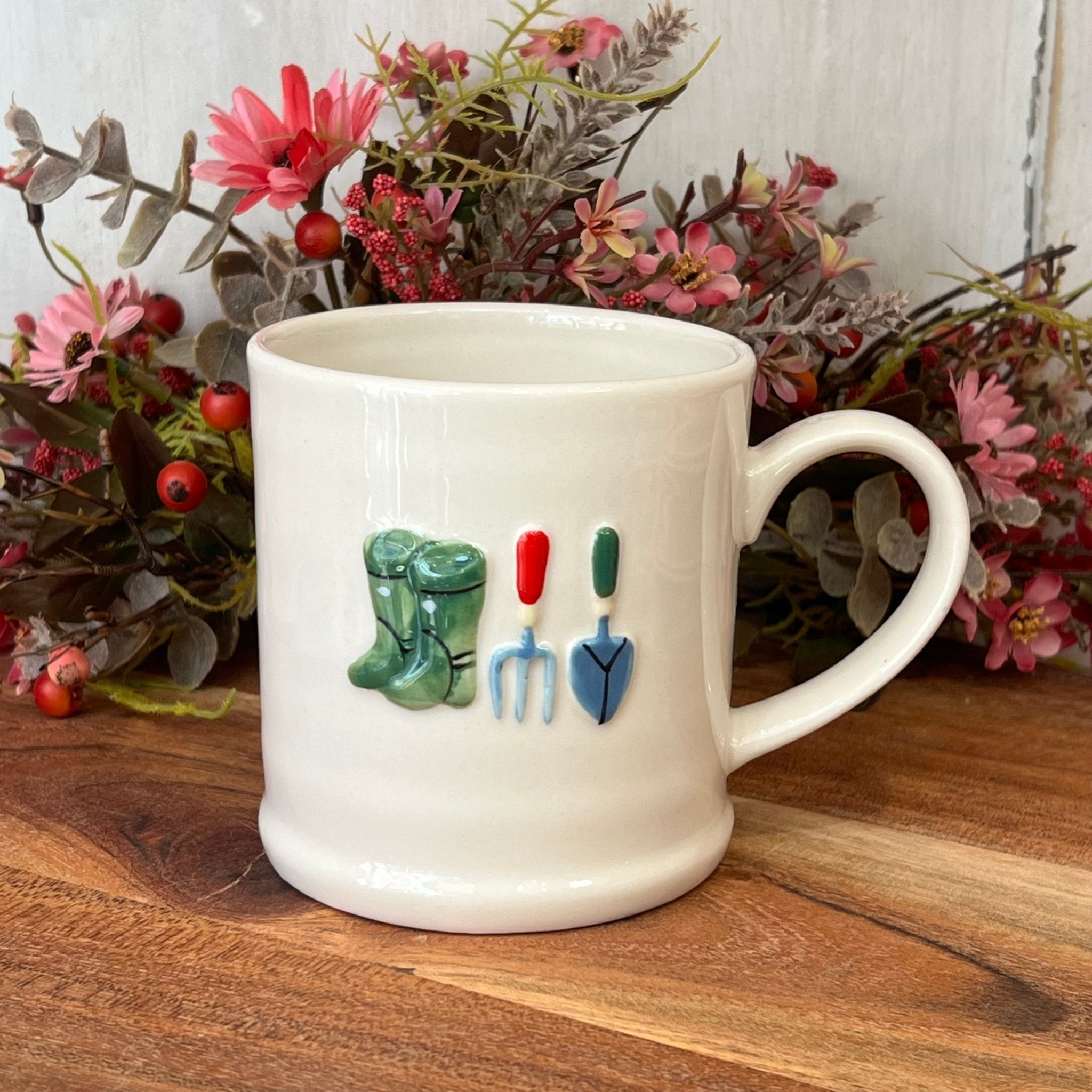Gisela Graham Gardening Stonewear Mug with a floral garden design, ceramic mug featuring vibrant colors and gardening-themed artwork.