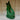 Large green Croggle Jug from The Gluggle Jug Factory with a glossy finish and distinctive shape, perfect for decorative use.