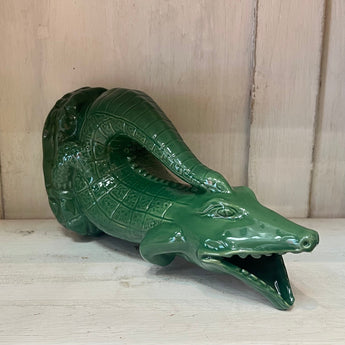 Large green Croggle Jug by The Gluggle Jug Factory, showcasing its distinctive shape and vibrant color.