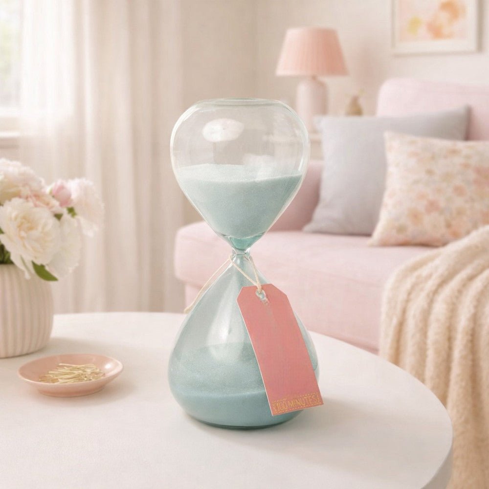 Designworks Collective blue ombre hourglass ornament with a 1-hour glass in elegant blue gradient design.