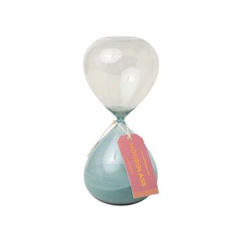 Blue ombre hourglass ornament by Designworks Collective, featuring a sleek glass design with a blue gradient finish.