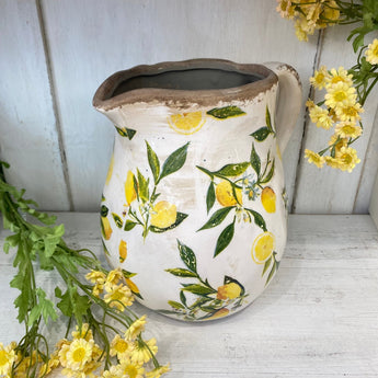Chic Antique Limone large ceramic jug with a textured lemon yellow finish and elegant handle for decorative or functional use.
