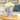 Casa Verde Long Tom Blue Splash Vase with a tall, slender shape and vibrant blue splash design, perfect for floral arrangements.