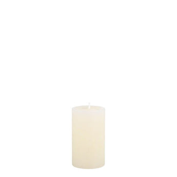 Chic Antique Macon Cream Pillar Rustic Candle, 30-hour burn time, with textured rustic design and warm cream color.