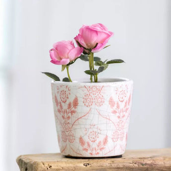 Three mini old-style Dutch pots in rose pink with assorted designs, made by Grand Illusions, displayed together.