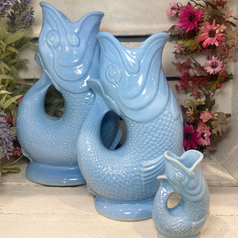 Large pale blue Gluggle Jug made by The Gluggle Jug Factory, featuring a traditional design and glossy finish.