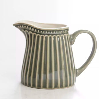Green Pembroke Stoneware Jug by Grand Illusions, featuring a classic ceramic design with a sturdy handle and glazed finish.