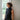 Chalk UK Posy women's sleeveless black roll neck top, stylish and fitted, made of soft fabric for casual or chic outfits.