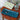 Blue rectangular enamel trinket dish by Rex B2B, featuring a smooth surface and raised edges, perfect for jewelry and small items.