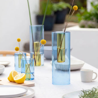 Reversible large glass vase in blue and yellow with a modern design, by Block Design, showcasing both color sides.