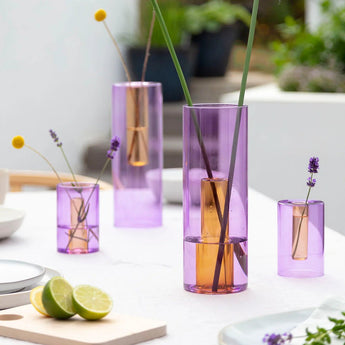 Reversible large glass vase with lilac and peach colors, designed by Block Design, showcasing its two-tone, elegant appearance.