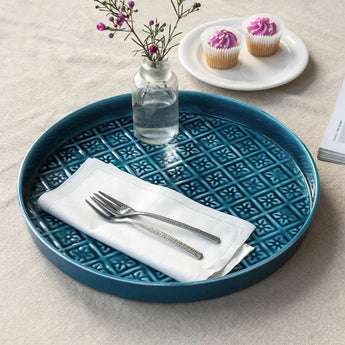 Blue round enamel trinket dish by Rex B2B with a smooth, glossy finish, perfect for jewelry or small personal items.