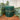 Rustic emerald scalloped pillar candle from Grand Illusions, 100x100mm with decorative scalloped edges, ideal for cozy decor.
