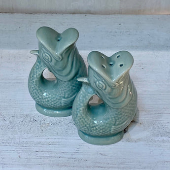 Set of Sage Salt and Pepper Gluggle Pots from The Gluggle Jug Factory, featuring charming ceramic condiment shakers with traditional design.