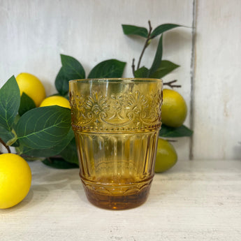 Colorful Saint-Émilion Vintage Baroque embossed glassware by Chic Antique, showcasing intricate embossed details and vibrant hues.