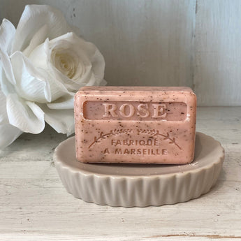 Chateau Du Savon Rose Broye French Marseille soap bar with a soft pink color and floral rose scent, displayed on a neutral background.