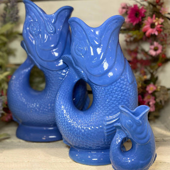 Large Sea Blue Original Gluggle Jug by The Gluggle Jug Factory, featuring a classic curved design and glossy finish.