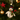 Felt snowman decoration with holly scarf, handmade by Amica, featuring a cheerful winter-themed design.