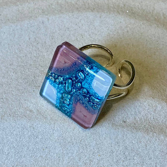 Colorful handcrafted glass ring with summer-inspired hues, designed by Bumble Living, showcasing vibrant, artistic jewelry style.