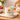 Gisela Graham sunflower stoneware mug with a vibrant sunflower design and sturdy ceramic handle for hot beverages.
