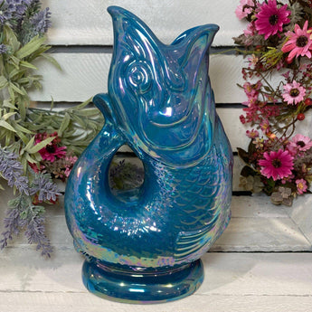 Teal Lustre Gluggle Jug XL from The Gluggle Jug Factory featuring a glossy teal finish and a distinctive spout design.