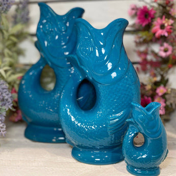 Teal Original Gluggle Jug XL by The Gluggle Jug Factory, featuring a classic ceramic design with a decorative spout and handle.