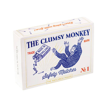 A box of The Clumsy Monkey Extra Long Matches from The Matchbox Maker, with long wooden matches and colorful packaging.