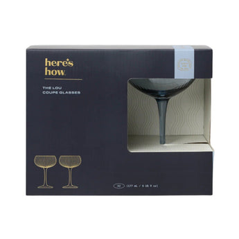 Set of 2 blue Lou Coupe wine glasses by Designworks Collective with rounded bowls and elegant stems.