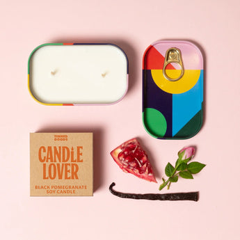 Black Pomegranate scented candle in a tin, from Block Design's Candle Lover Tuscan Fig collection, perfect for cozy ambiance.
