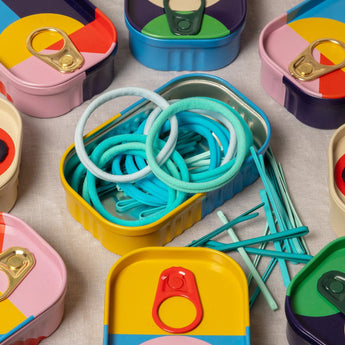 Set of Block Design tinned hair ties and clips, colorful hair accessories for styling and managing hair.