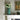 Turquoise ceramic rustic tall vase with handles by Grand Illusions, featuring a textured finish and a classic curved shape.