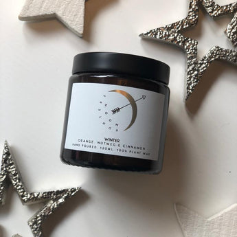 Hunters Moon LTD scented candle with winter spiced orange, nutmeg, and cinnamon in a midi size, perfect for cozy winter ambiance.