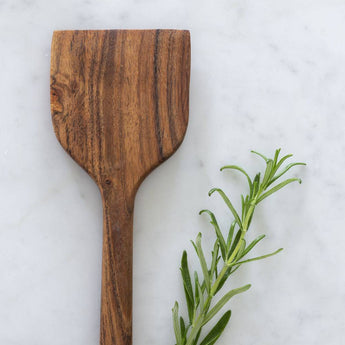 Acacia wooden spatula from Grand Illusions, kitchenware, showing smooth, natural wood finish and functional cooking tool design.
