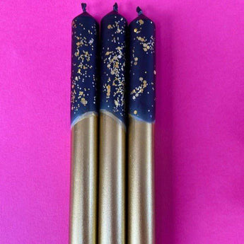 Set of three black and gold dip dye dinner candles from Colour Emporium, featuring elegant design and tapered shape.
