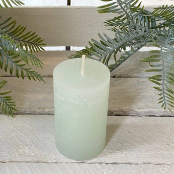 Rustic Bright Verte pillar candle by Chic Antique, 16-hour burn time, showcasing textured wax and warm, natural design.