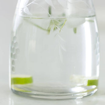 Grand Illusions Rambling Vine etched glass carafe jug with intricate vine pattern and elegant design.