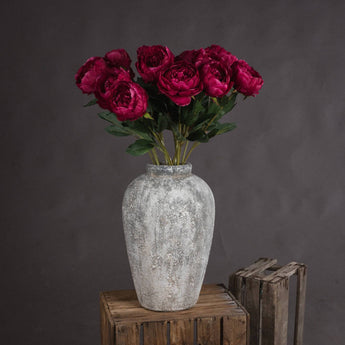 Single stem of Cerise Peony faux flowers by Hills Interiors, showcasing vibrant pink artificial peony blossoms.