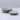 Set of two dark grey ceramic trinket dishes with leaf designs by Gisela Graham, perfect for jewelry or small items.