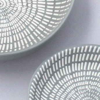 Set of two dark grey ceramic leaf-patterned trinket dishes by Gisela Graham, perfect for jewelry or small items.