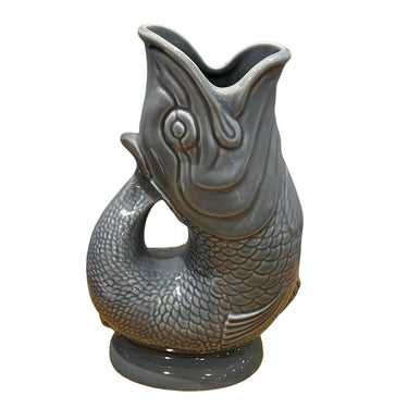 Large denim blue Gluggle Jug from The Gluggle Jug Factory, showcasing its classic ceramic design and distinctive spout.